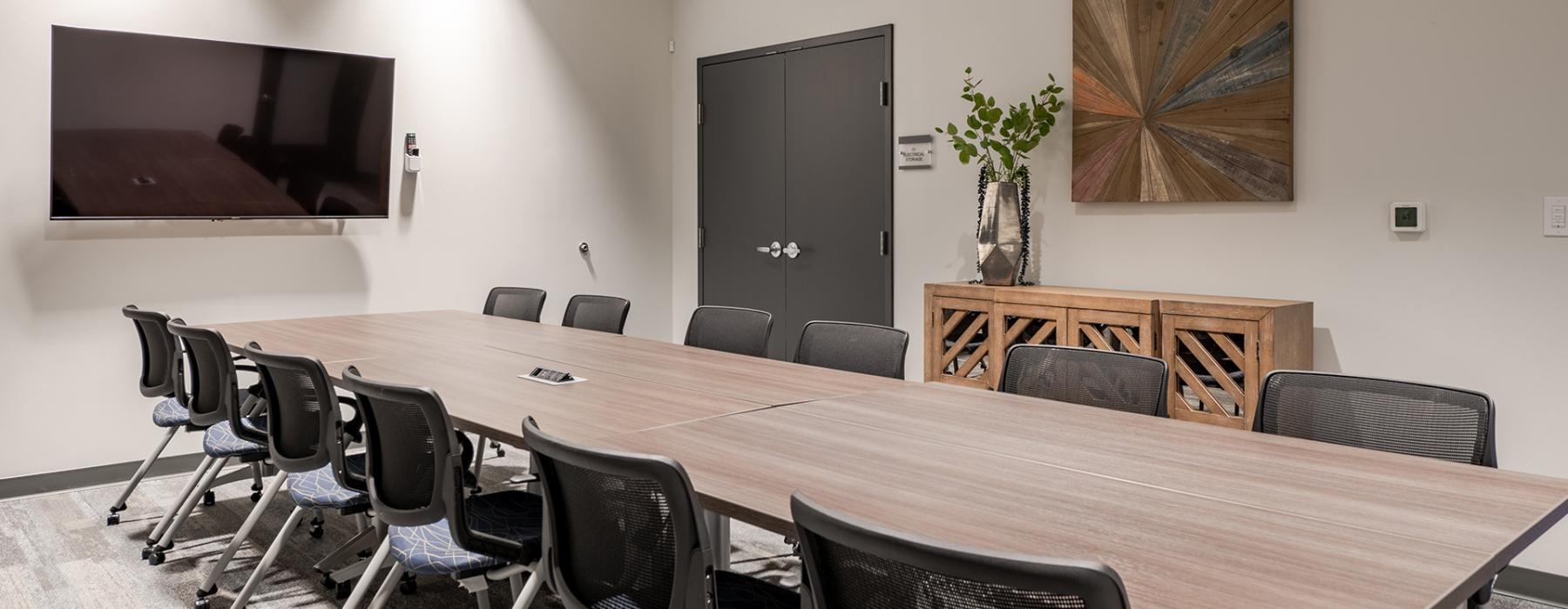 a conference room with a large table