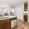 a kitchen with white cabinets