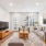 a living room with a tv and couches