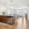 a kitchen with wooden floors