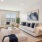a living room with a tv and couches