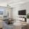 a living room with a tv and couches