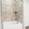 a bathroom with a bathtub and shower