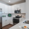 kitchen with white cabinets and stainless steel appliances