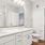 a bathroom with a large mirror